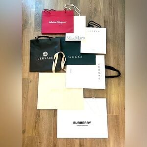 8 Authentic designer bags (Burberry, Gucci, etc.)